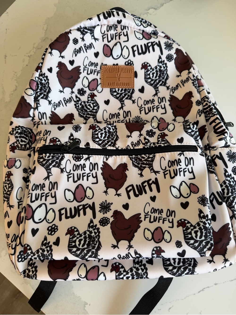 Matt Matthew’s Forever Fluffy Backpack - White with Brown Chicken Print